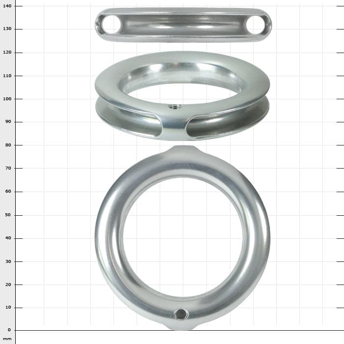 TunnelRing RG80, drei silberne Metallteile in unterschiedlichen Formen und Größen, auf kariertem Hintergrund angeordnet