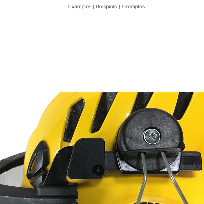 Nahaufnahme des Befestigungsmechanismus des ECC Klarsichtvisiers an einem gelben Helm mit schwarzen Lüftungsschlitzen und schwarzem Befestigungsteil