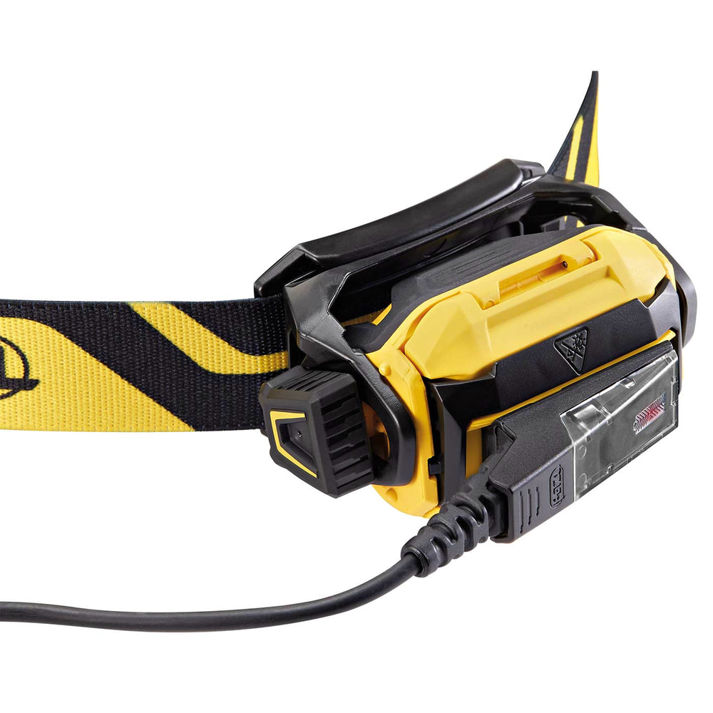 Petzl Pixa R Stirnlampe mit gelb-schwarzem Kopfband, Rückseite mit Anschlusskabel und Klipphalterung