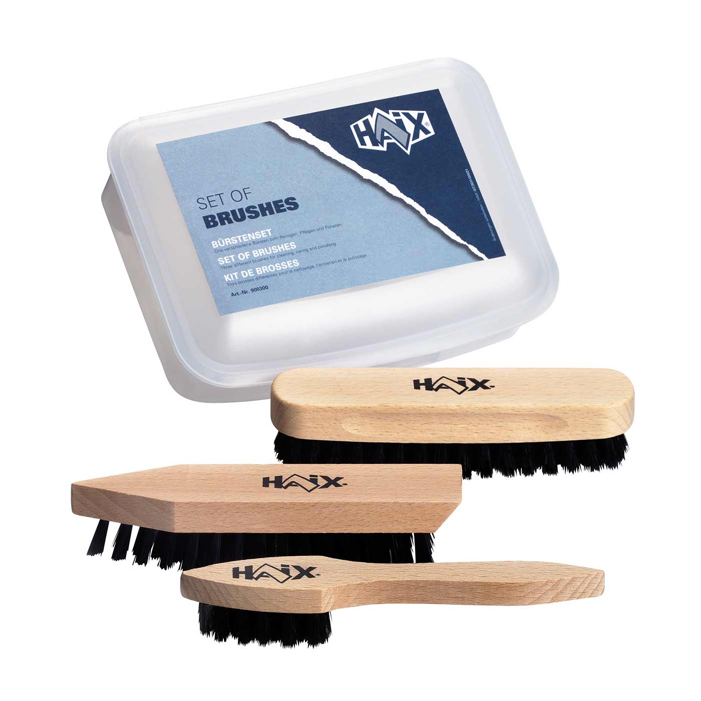 Bürsten Set von HAIX mit drei Holzbürsten unterschiedlicher Form und schwarzem Borstenbesatz sowie einer transparenten Kunststoffbox mit blauem Etikett und HAIX-Logo