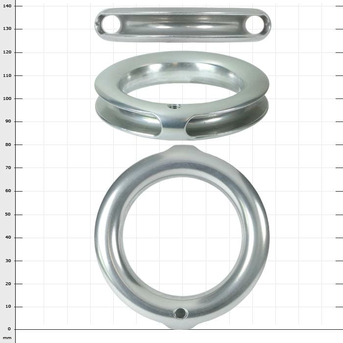 TunnelRing RG80, drei silberne Metallteile in unterschiedlichen Formen und Größen, auf kariertem Hintergrund angeordnet