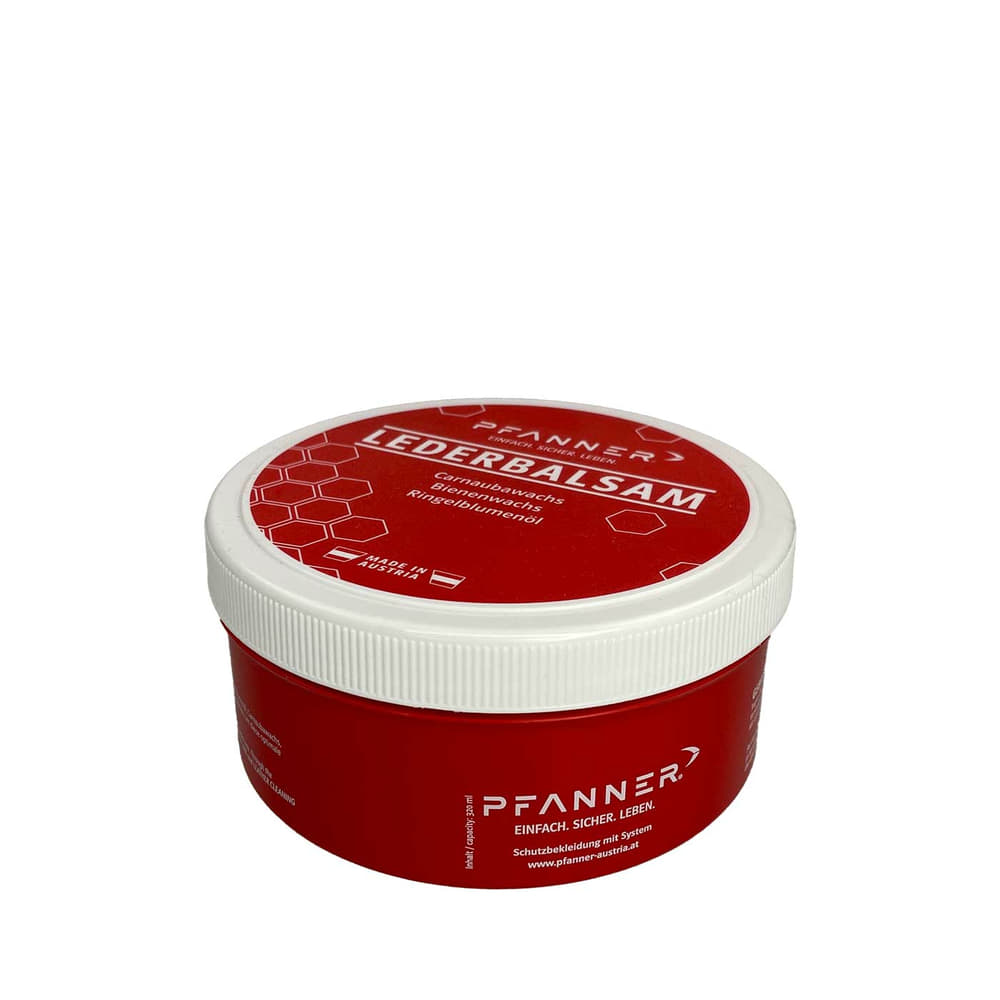 Pfanner Bio-Lederbalsam in rotem runden Kunststoffbehälter mit weißem Schraubdeckel, Aufschrift Lederbalsam und Inhaltsstoffe, hergestellt in Österreich