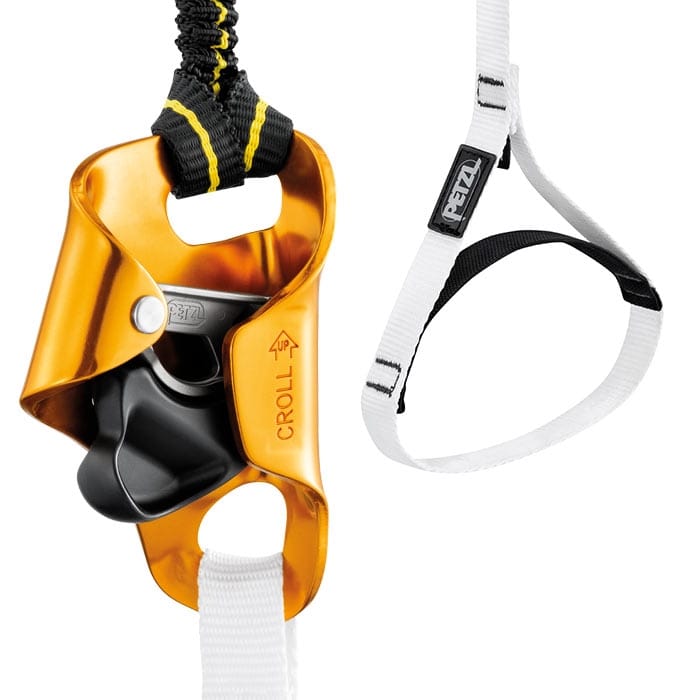 Nahaufnahme des gelben Aufstiegshilfsgeräts Croll von Petzl mit schwarzem und weißem Band