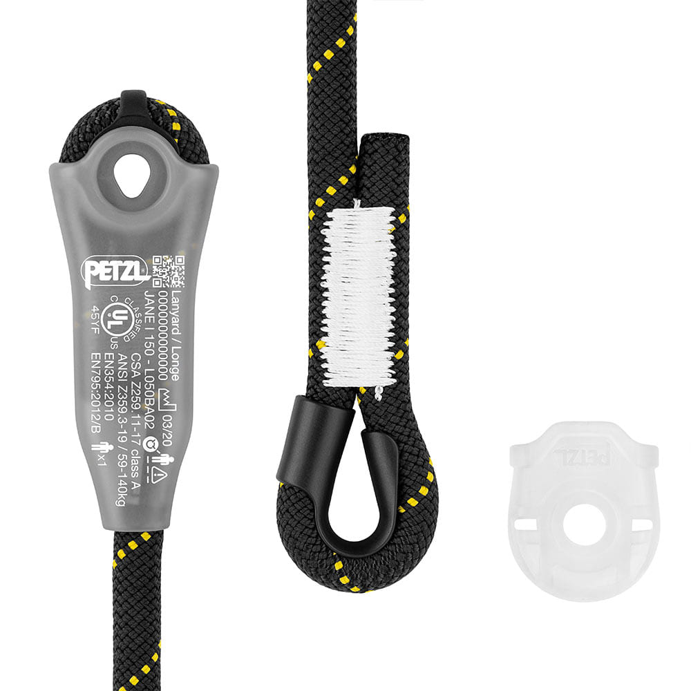 Nahaufnahme des Petzl Jane-I Sicherungsgeräts mit Beschriftung, schwarzes Seil mit gelben Punkten und weißer Naht, dazu ein kleiner transparenter Kunststoffring