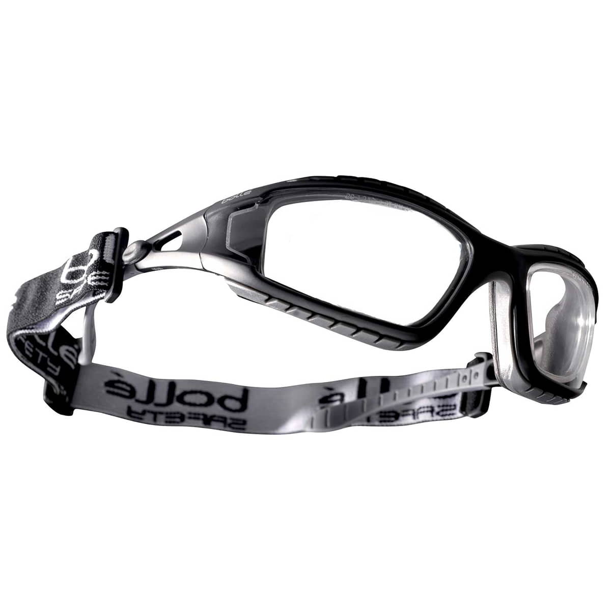 Tracker II von Bollé, schwarze Schutzbrille mit klarem Glas und verstellbarem schwarz-weißem Gummiband mit Aufdruck bollé, seitliche Ansicht