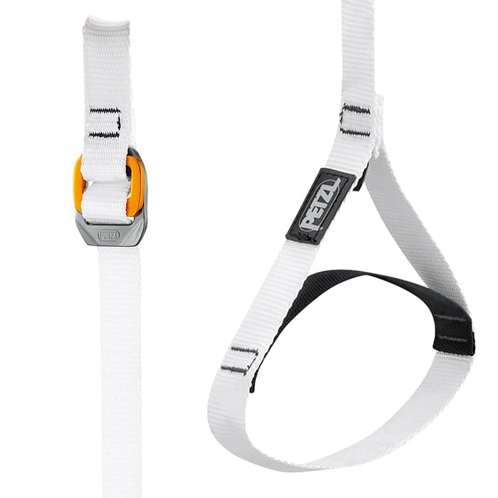 Nahaufnahme des weißen Knee Ascent Loop Unteres Band mit gelb-grauem Verschluss, schwarzem PETZL-Logo und schwarzem Polster am unteren Bandabschnitt