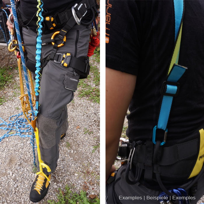 Bungeetool in Blau mit elastischem, gewelltem Abschnitt und flachem Gurtband mit schwarzem Rand und grünem Innenstreifen an grauer Outdoorhose mit Kletterausrüstung und gelb-schwarzen Bergschuhen