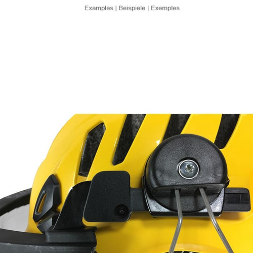 Nahaufnahme des Befestigungsmechanismus des ECC Klarsichtvisiers an einem gelben Helm mit schwarzen Lüftungsschlitzen und schwarzem Befestigungsteil