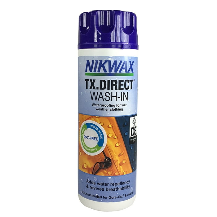 Nikwax TX-Direct Wash-In Flasche mit blauem Deckel und Aufschrift, Produkt für Imprägnierung