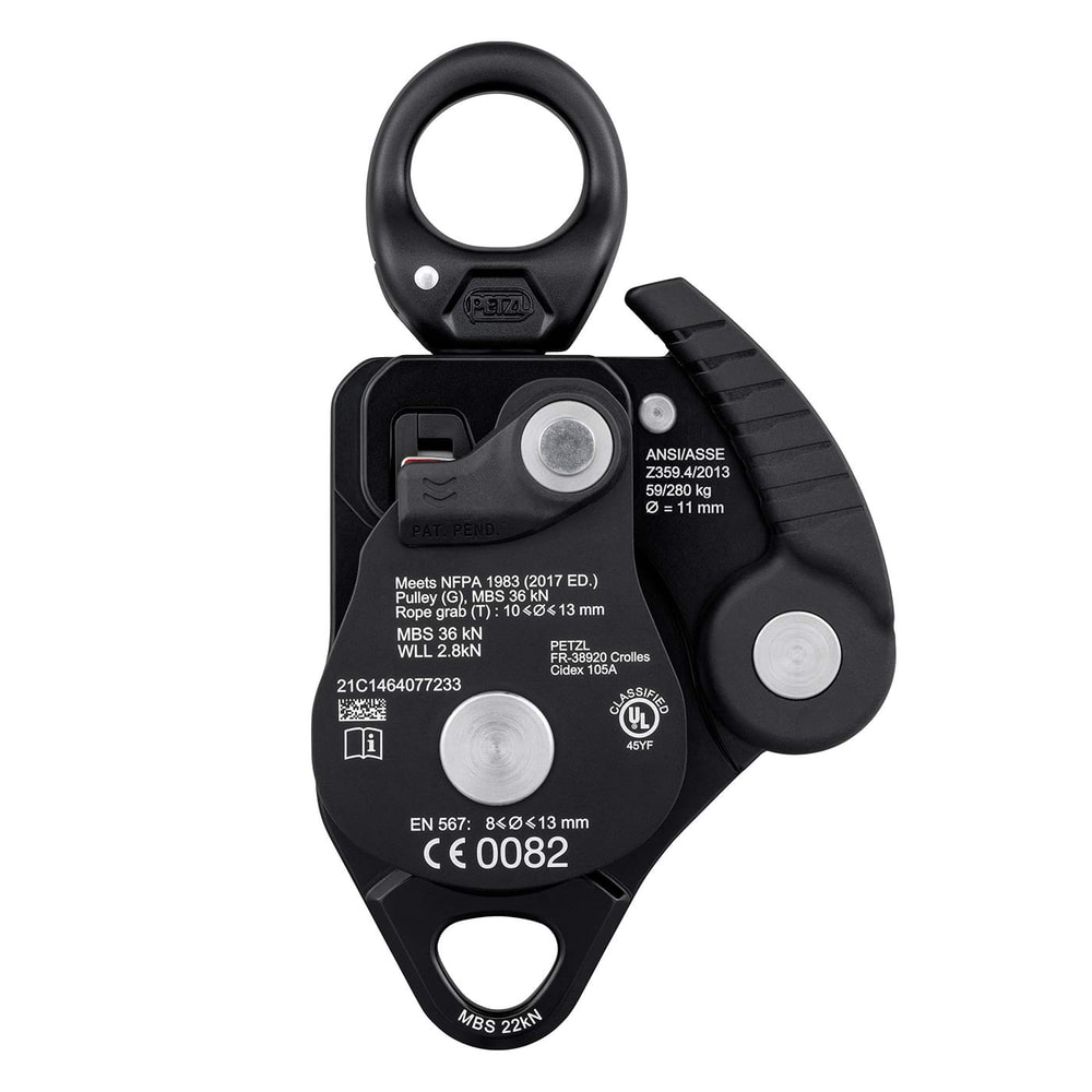 Petzl Twin Release Seilrolle Rückseite in Schwarz mit technischen Angaben und Normen