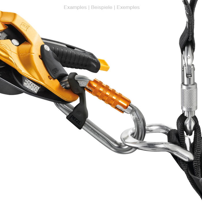 Petzl Captiv, schwarzes Kunststoffteil an einem silbernen Karabiner, befestigt an einem gold-schwarzen Sicherungsgerät und weiteren Karabinern