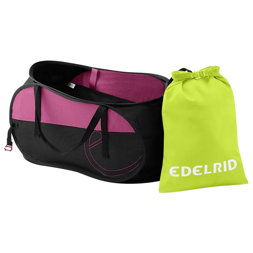 Spring Bag 30 von Edelrid in Schwarz und Pink mit zwei Tragegriffen und einem kleinen Beutel in Neongelb mit weißem Edelrid-Logo