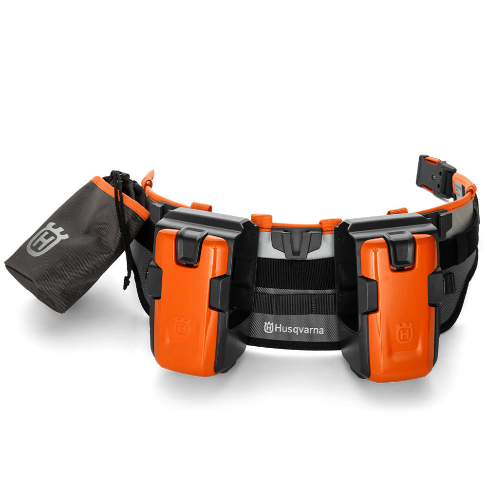 Flexi Carrier Kit von Husqvarna, schwarzer und oranger Gürtel mit zwei orange-schwarzen Halterungen und einer schwarzen Tasche mit Husqvarna-Logo