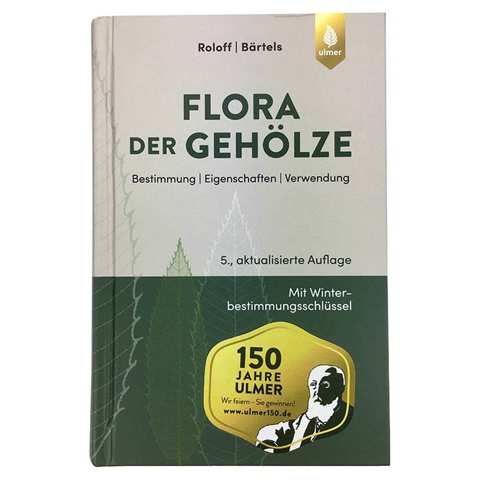 Buch "Flora der Gehölze" von Roloff und Bärtels, 5. aktualisierte Auflage, Verlag Ulmer, mit grünem und beigem Cover und einem goldenen Aufkleber "150 Jahre Ulmer"