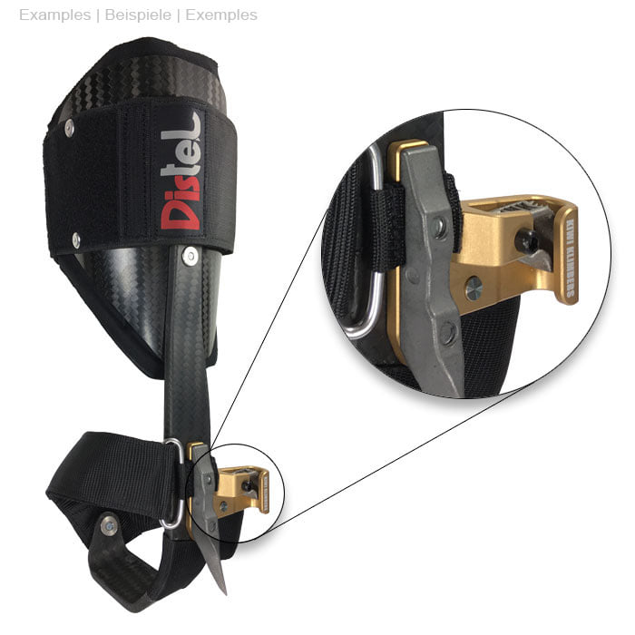 SpikeSender 2 L von Kiwi Klimbers, an einem schwarzen und grauen Halter mit Textilband und Karabiner befestigt