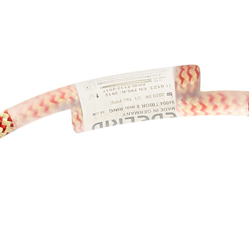 Detailaufnahme eines Etiketts am Tibor Loop Ring mit Textinformationen und Schutzfolie